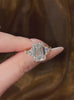 Video of lab-grown diamond emerald cut three stone ring for elegant proposals