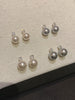 Video view of halo drop high-lustre freshwater pearl earrings styled for wedding guest looks