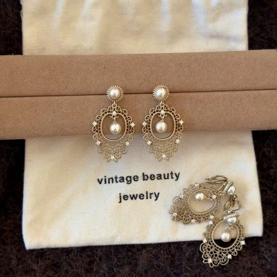 Video view of lace drop high-lustre freshwater pearl earrings styled for wedding guest looks