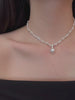 Video view of layered silver-tone high-lustre freshwater pearl necklace styled for weddings