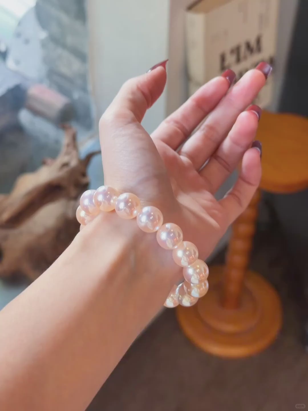 Video view of blush strand high-lustre freshwater pearl bracelet styled for bridal styling