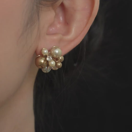 Video view of pearl cluster stud high-lustre freshwater pearl earrings styled for wedding guest looks