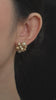 Video view of pearl cluster stud high-lustre freshwater pearl earrings styled for wedding guest looks