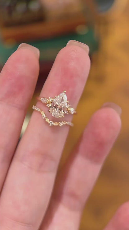 Video of lab-grown diamond pear bridal stacking ring for bridal ring stacks