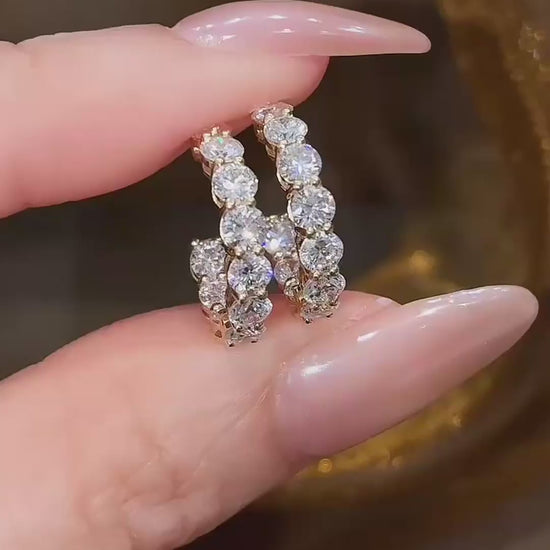 Video of lab-grown diamond crescent earrings for date nights