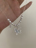 Video view of butterfly pendant high-lustre freshwater pearl necklace styled for weddings