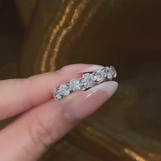 Video of lab-grown diamond emerald cut full eternity ring for wedding bands