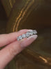 Video of lab-grown diamond emerald cut full eternity ring for wedding bands