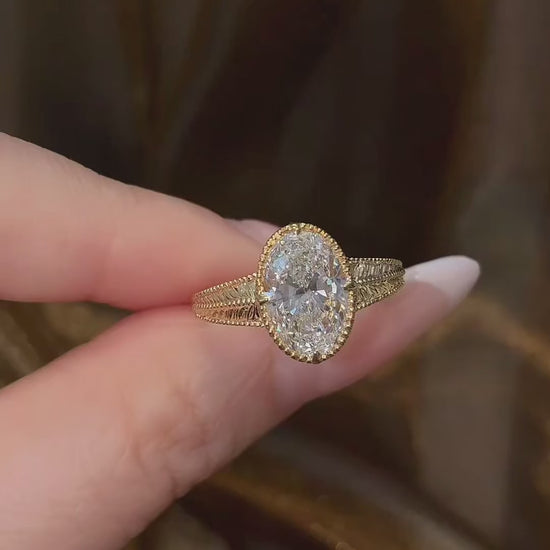 Video of lab-grown diamond engraved oval vintage ring for romantic proposals