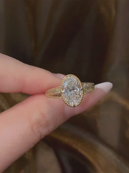 Video of lab-grown diamond engraved oval vintage ring for romantic proposals