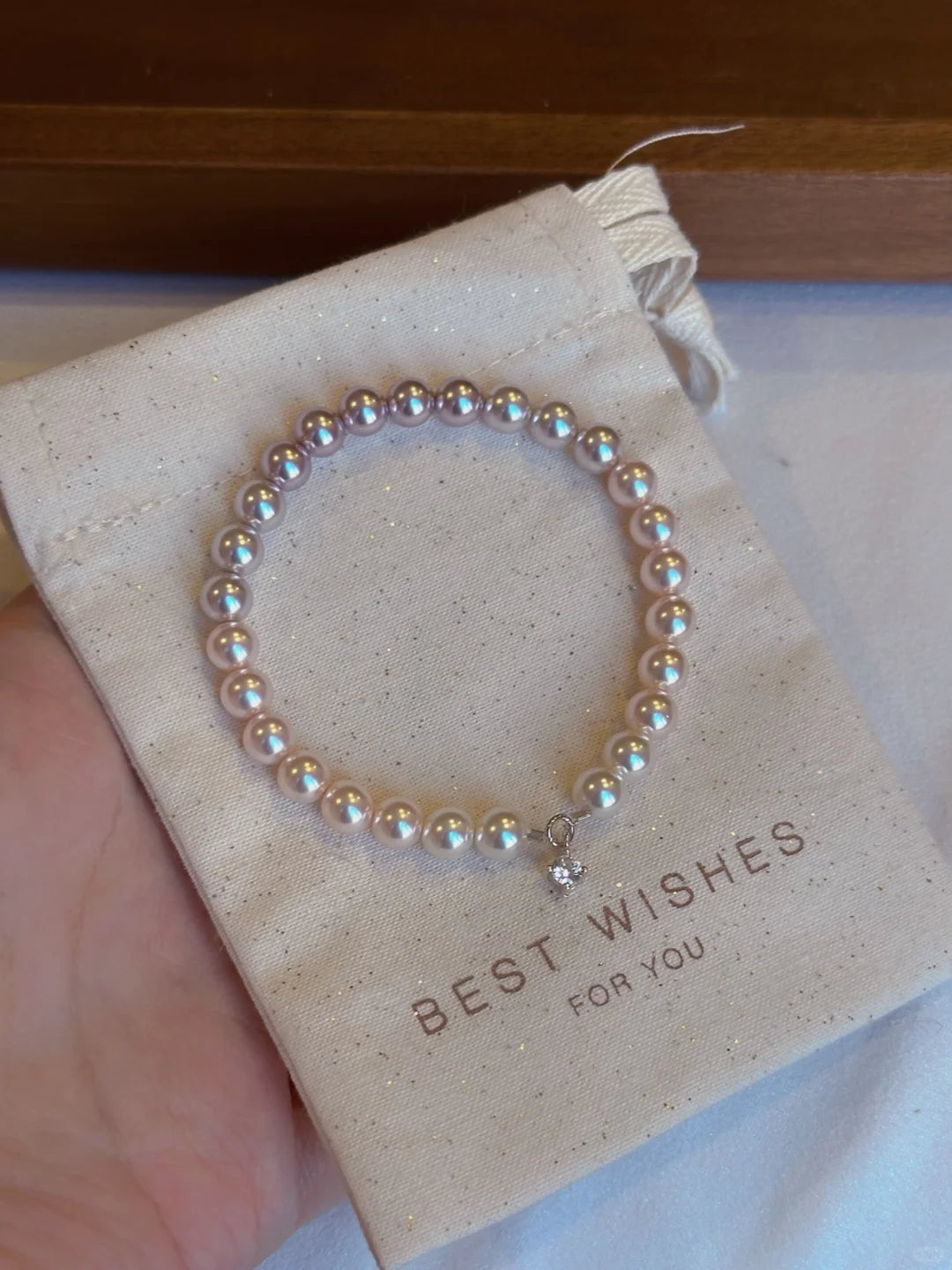 Front view of classic strand high-lustre freshwater pearl bracelet for bridal styling