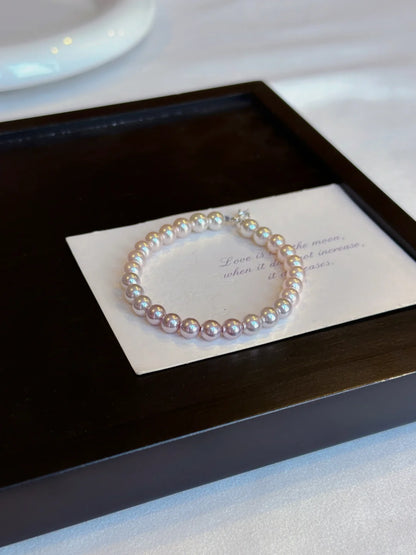 Close-up of classic strand high-lustre freshwater pearl bracelet for bridal styling