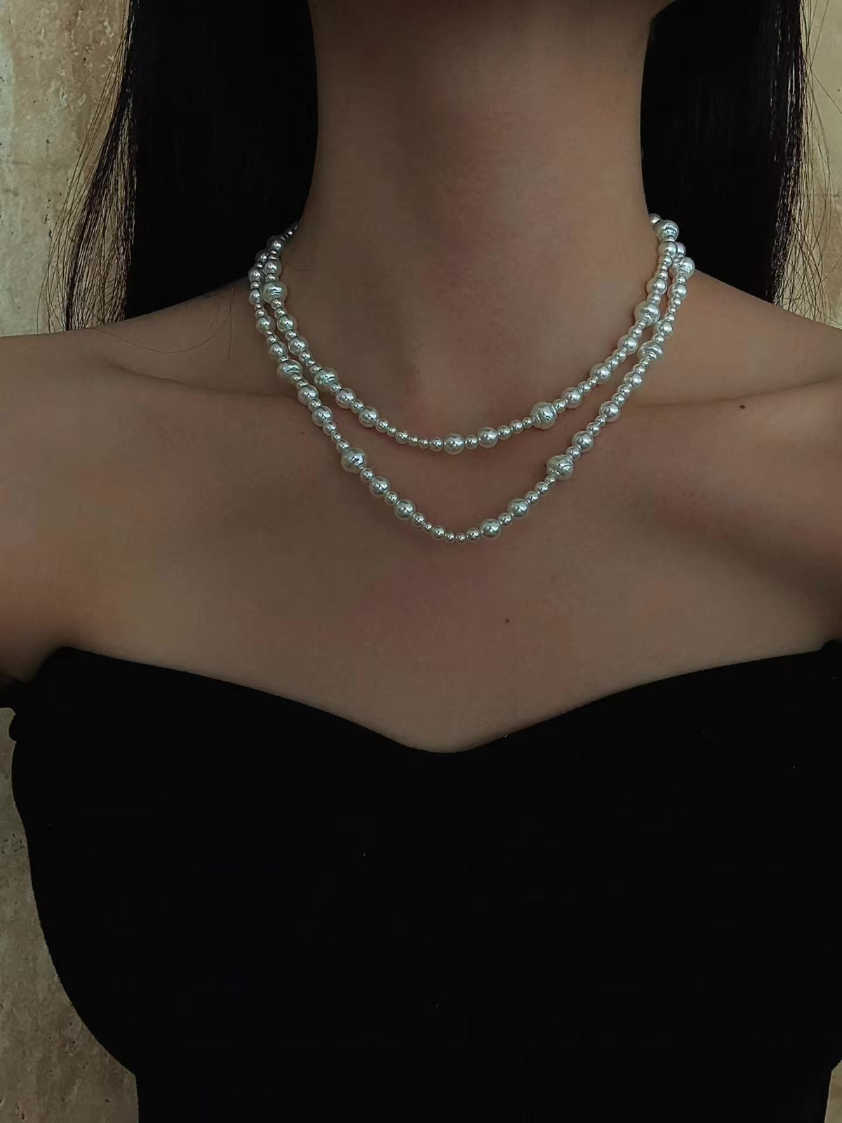 Styled view of poetic pendant high-lustre freshwater pearl necklace for weddings