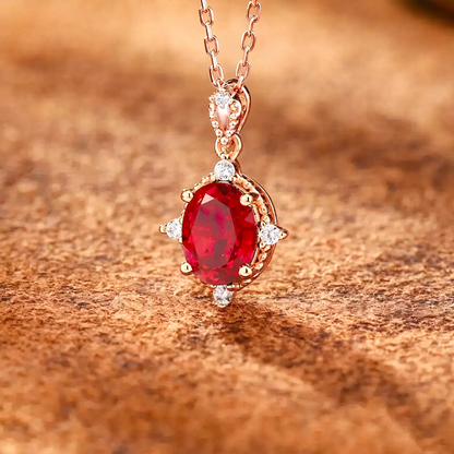 Close-up of oval lab-grown ruby pendant necklace in 16K gold for anniversary gifts