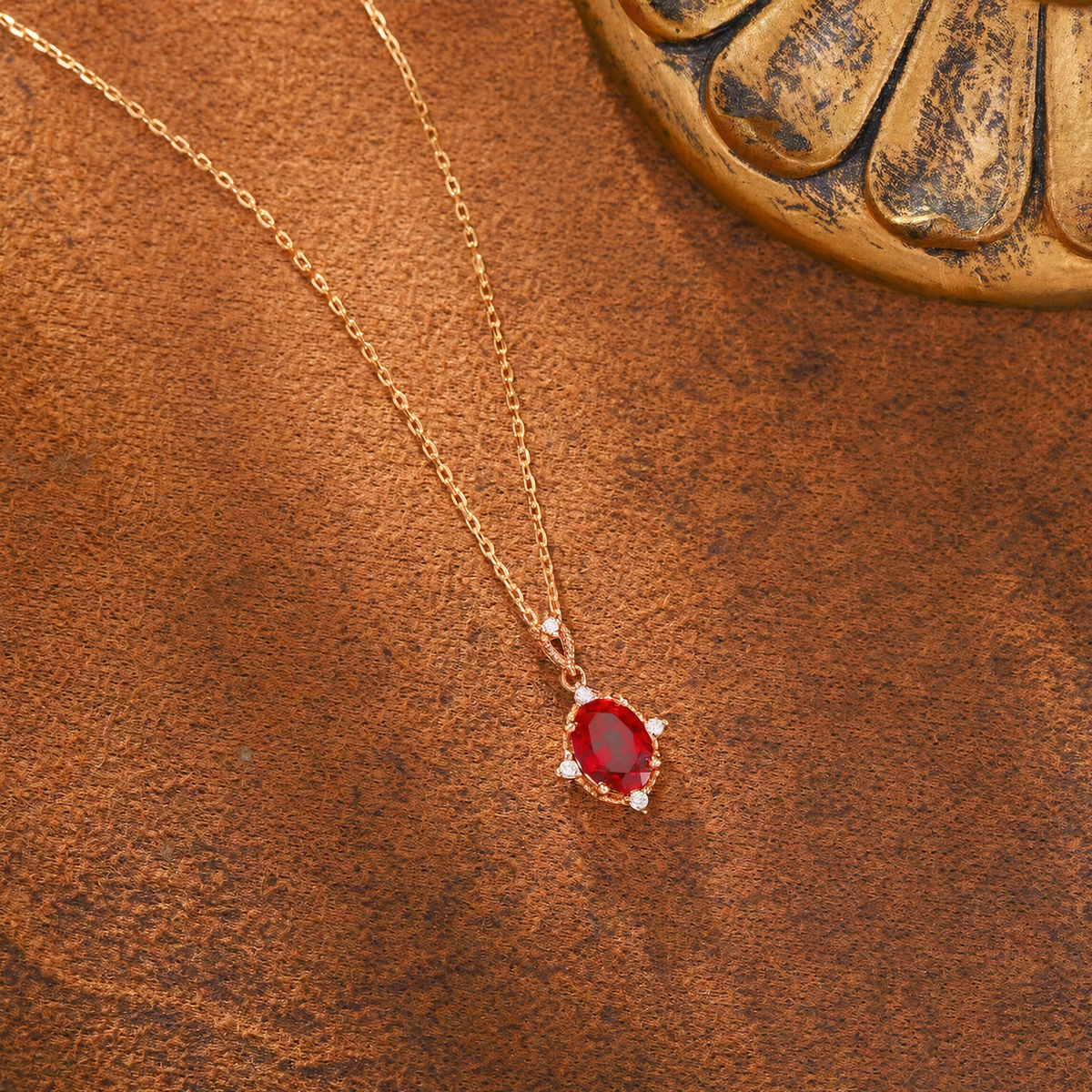 Side view of oval lab-grown ruby pendant necklace in 16K gold for anniversary gifts