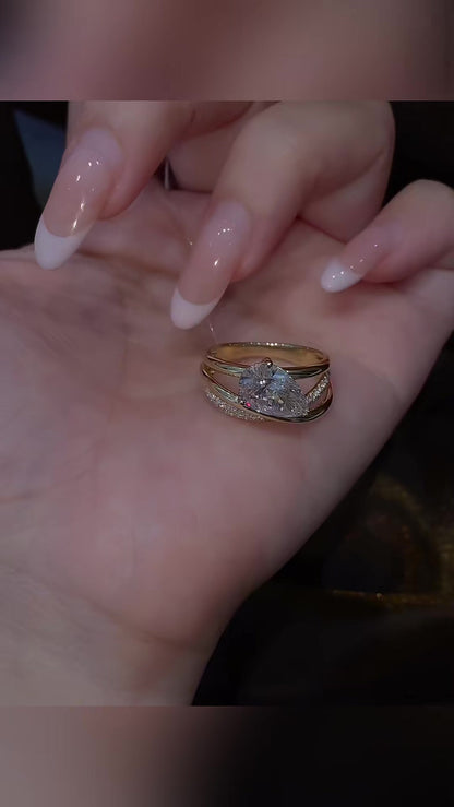 Styled view of lab-grown diamond pear stacking engagement ring for stylish proposals
