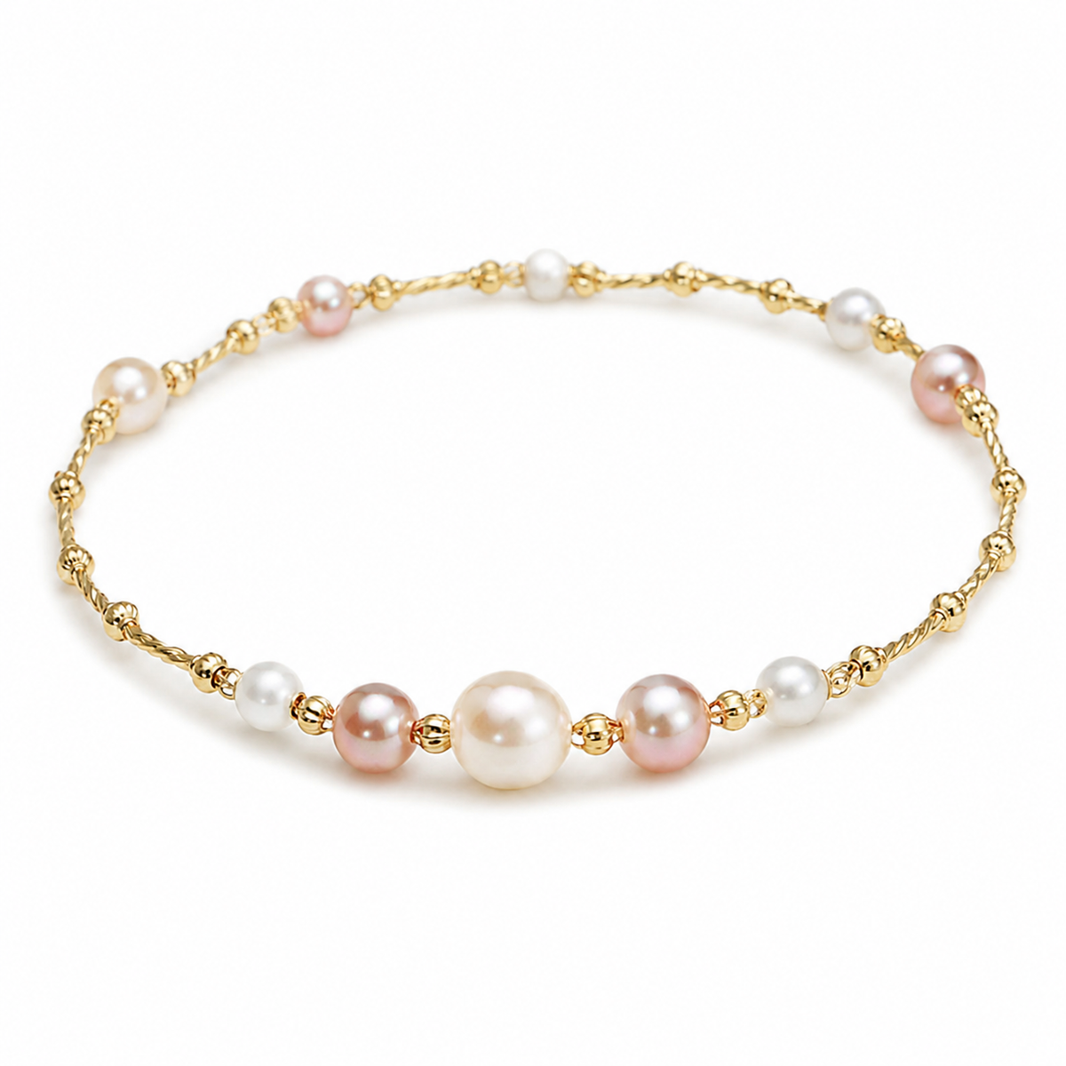 Roselle freshwater pearl station bracelet in 14K gold on a white background