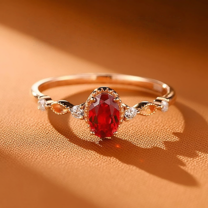 Detail view of oval lab-grown ruby vine ring in 16K gold and S925 sterling silver for romantic gifts