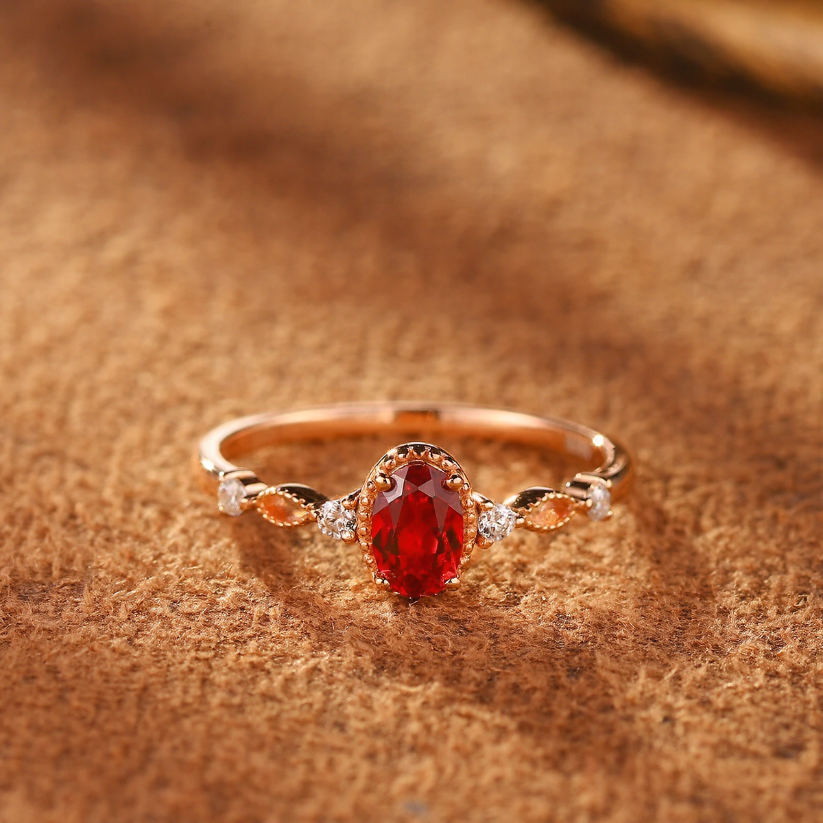 Front view of oval lab-grown ruby vine ring in 16K gold and S925 sterling silver for romantic gifts