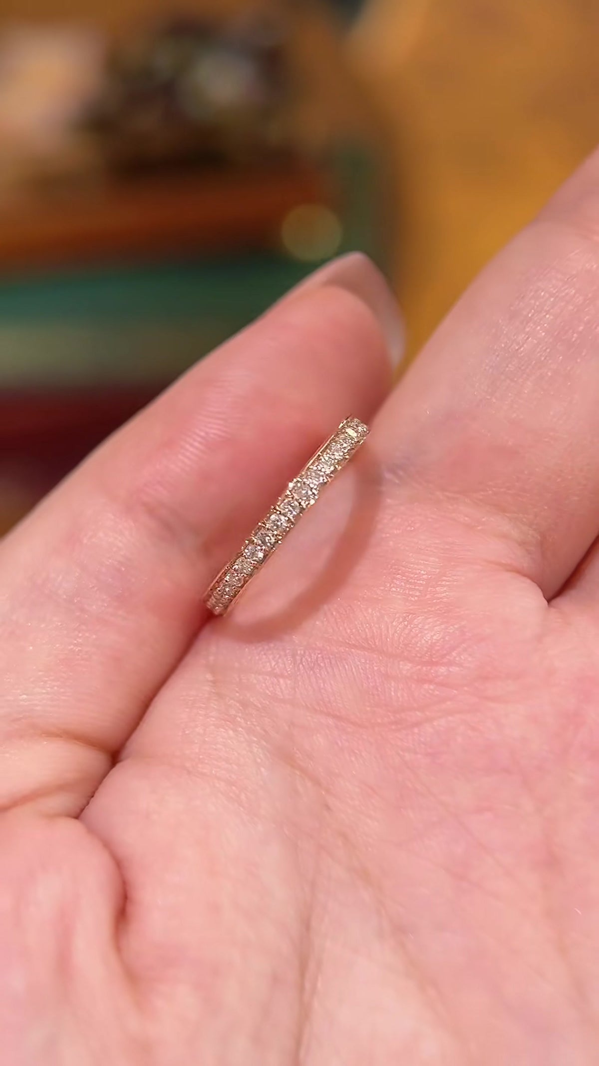 Front view of lab-grown diamond rose gold pave wedding band for wedding ring stacks