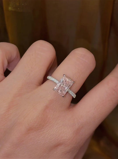 Close-up of lab-grown pink diamond radiant engagement ring for romantic proposals