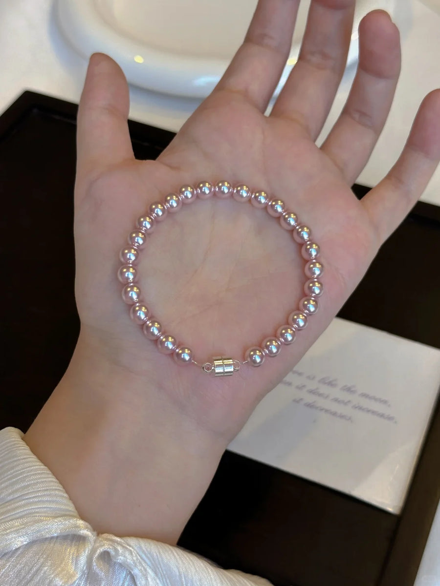 Front view of pink pearl high-lustre freshwater pearl bracelet for bridal styling