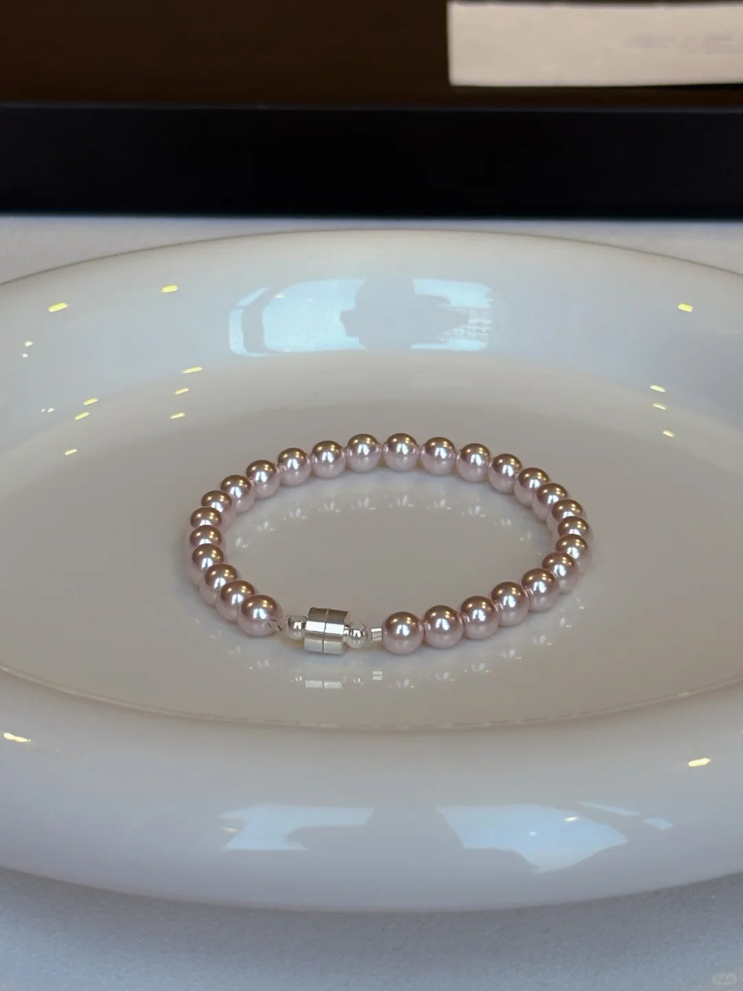 Close-up of pink pearl high-lustre freshwater pearl bracelet for bridal styling