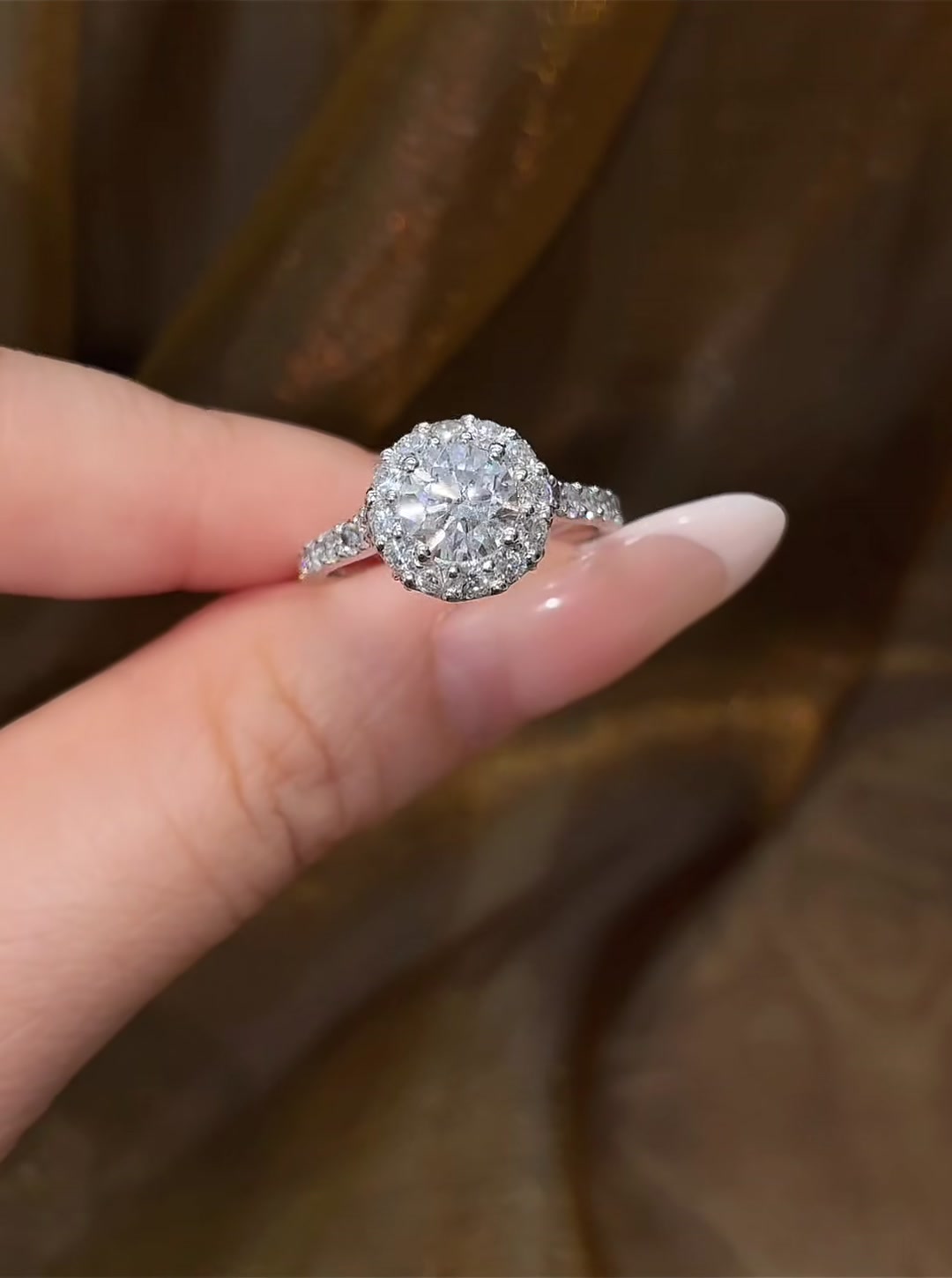 Front view of lab-grown diamond round halo engagement ring for classic proposals