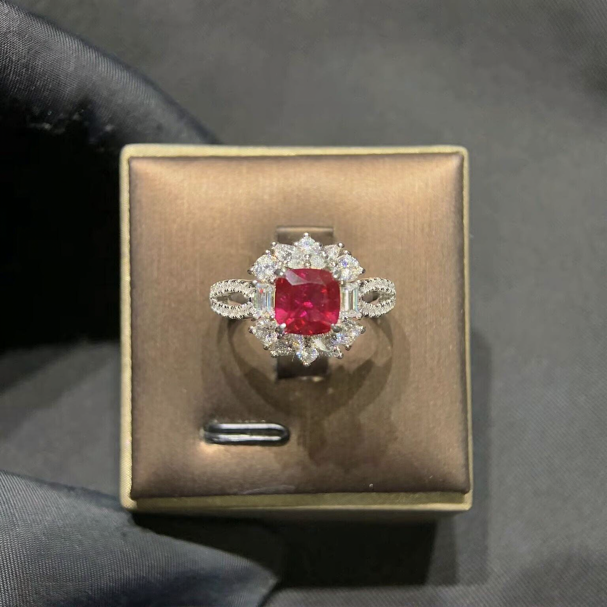 Front view of radiant-cut lab-grown ruby cluster ring for engagement celebrations