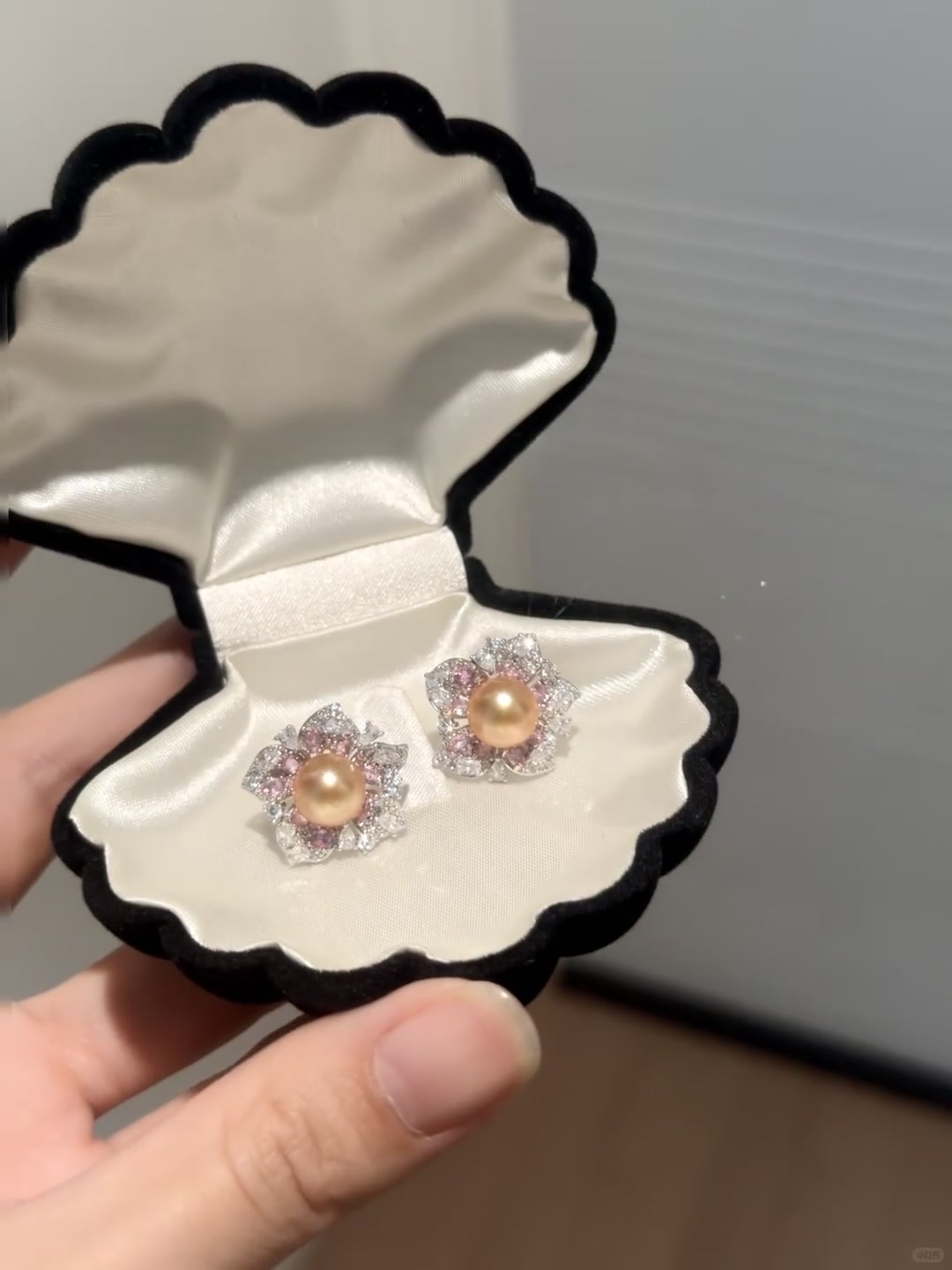 Front view of golden flower stud high-lustre freshwater pearl earrings for wedding guest looks