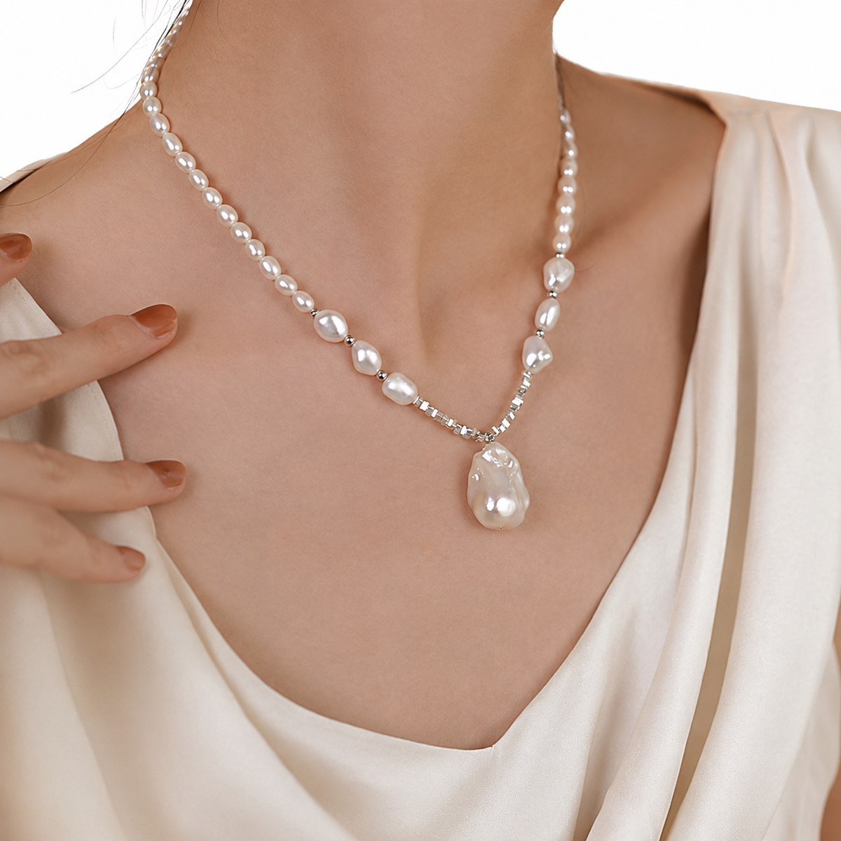 Freshwater pearl and faceted bead necklace styled with a satin dress