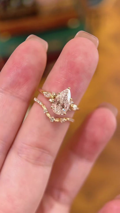 Close-up of lab-grown diamond pear bridal stacking ring for bridal ring stacks