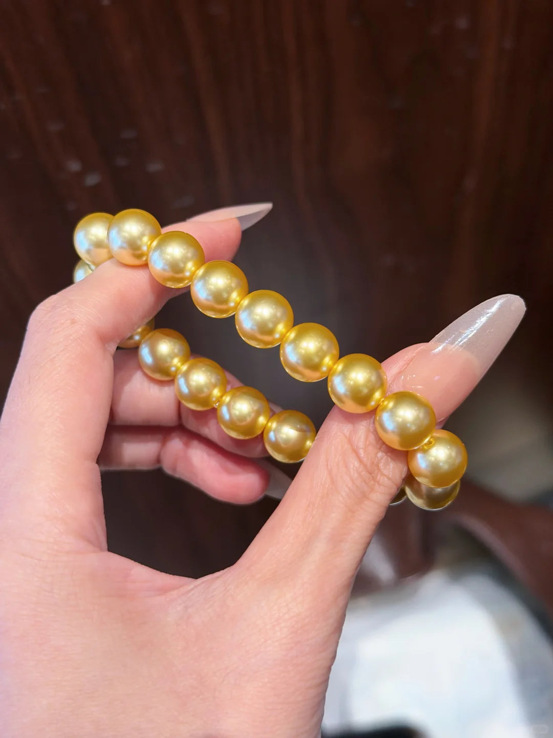 Front view of golden strand high-lustre freshwater pearl bracelet for bridal styling