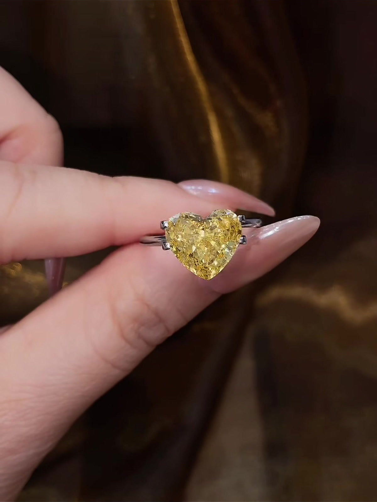 Front view of lab-grown yellow diamond heart engagement ring for bold proposals