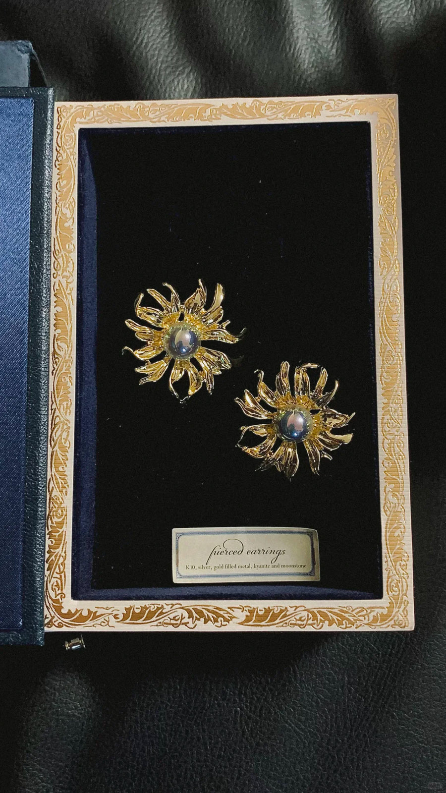 Front view of sunburst high-lustre freshwater pearl earrings for wedding guest looks