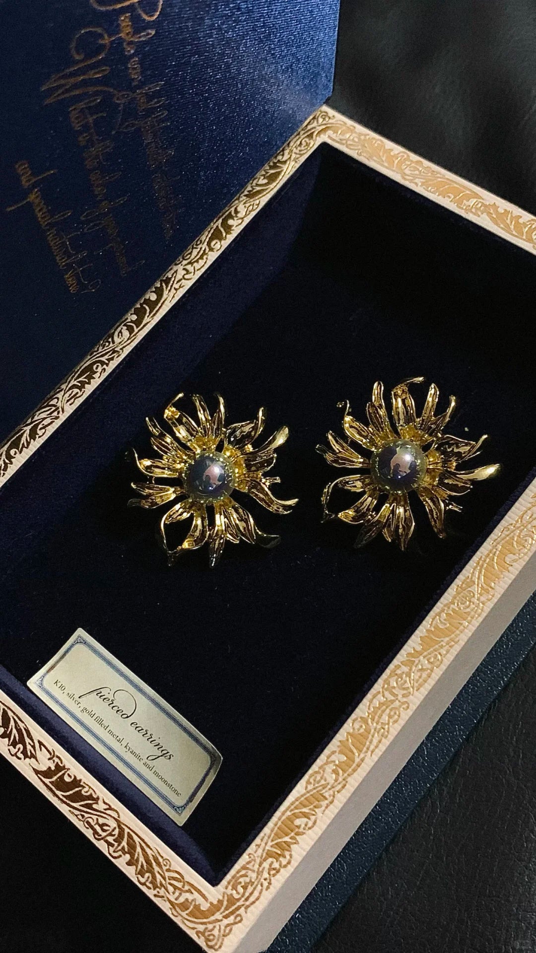 Styled view of sunburst high-lustre freshwater pearl earrings for wedding guest looks