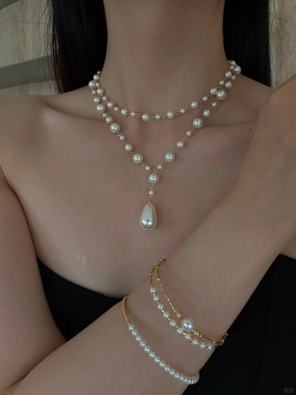 Front view of layered y high-lustre freshwater pearl necklace for weddings