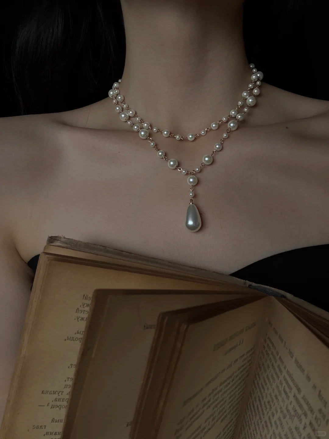 Close-up of layered y high-lustre freshwater pearl necklace for weddings