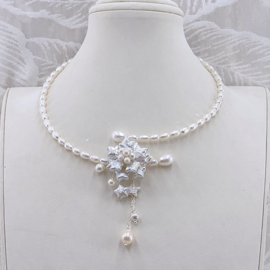 Front view of Starlight Rice Pearl Necklace, a natural freshwater baroque pearl necklace for anniversary gifts