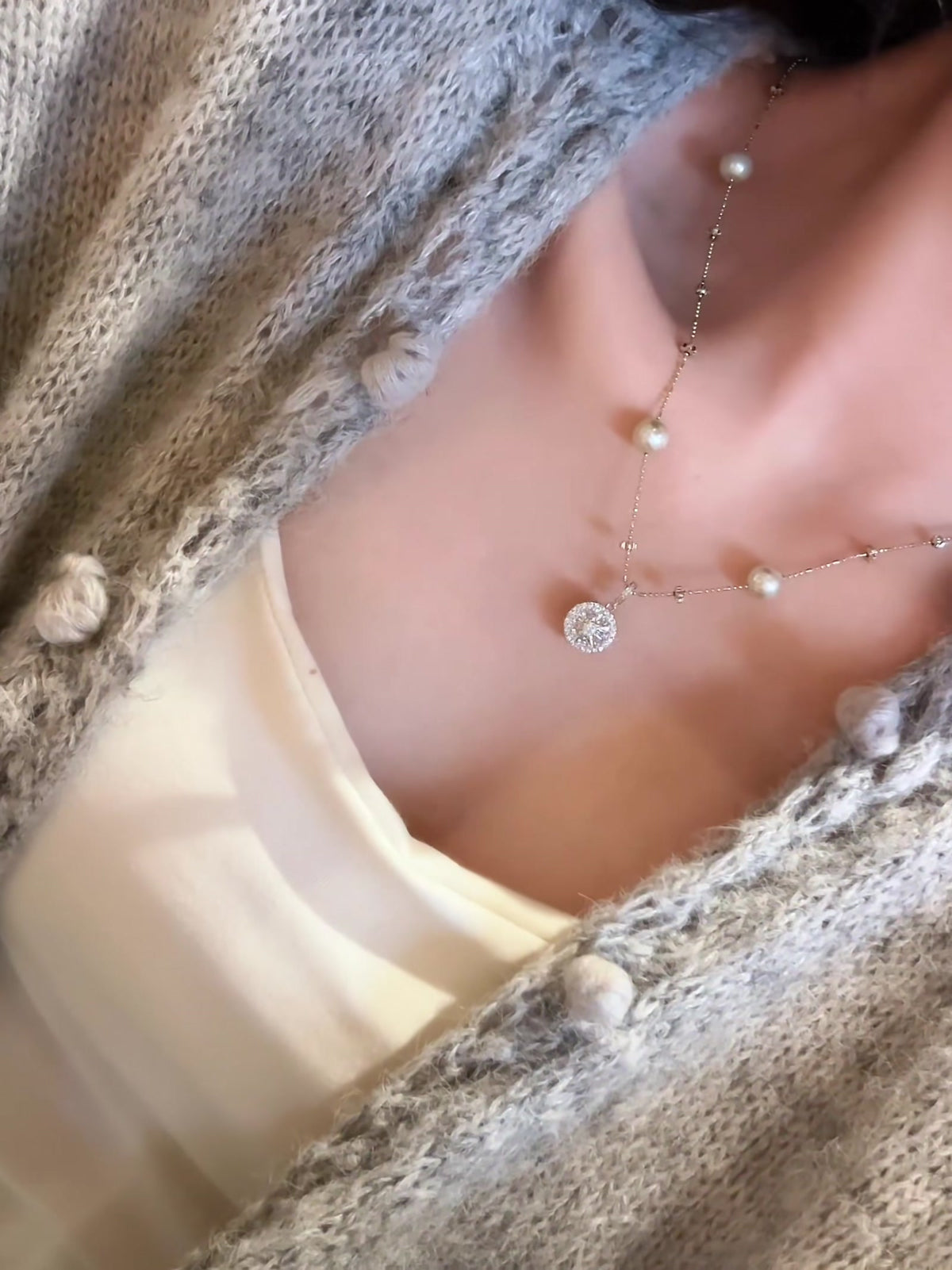 Styled view of compass pendant high-lustre freshwater pearl necklace for weddings