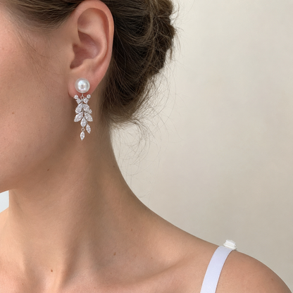 Model wearing long Akoya pearl leaf drop earrings