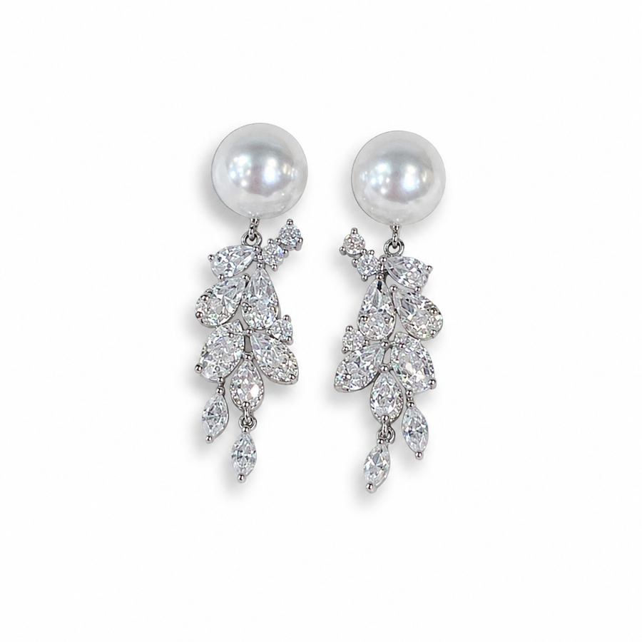Sylva 10–12mm Akoya pearl leaf drop earrings on a white background
