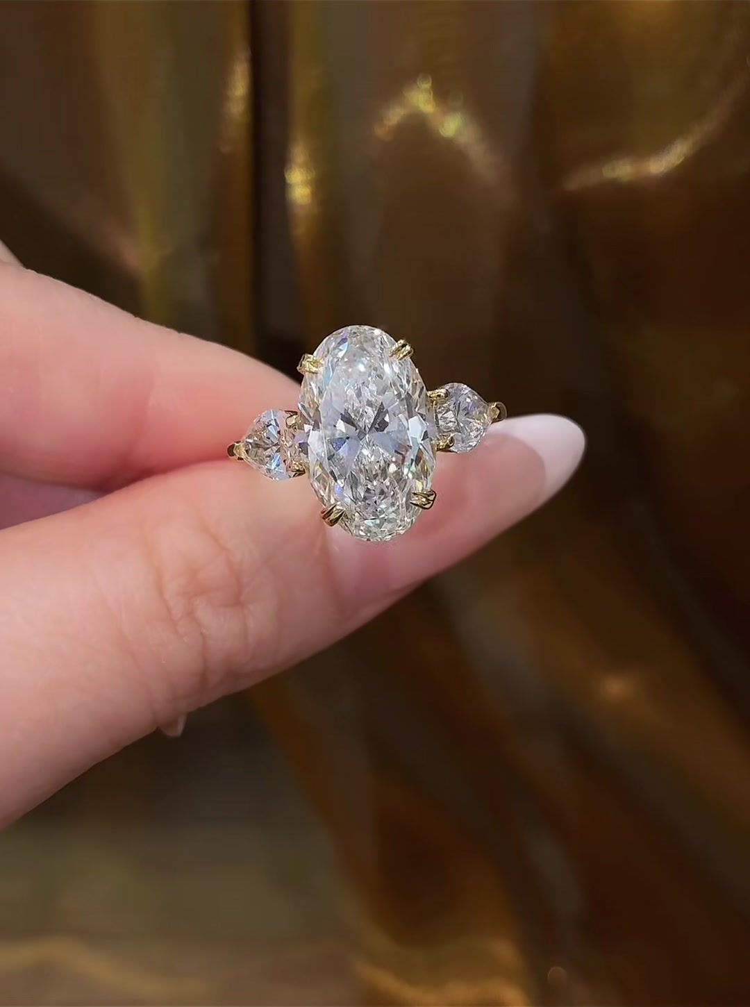 Front view of lab-grown diamond oval three stone engagement ring for engagement proposals