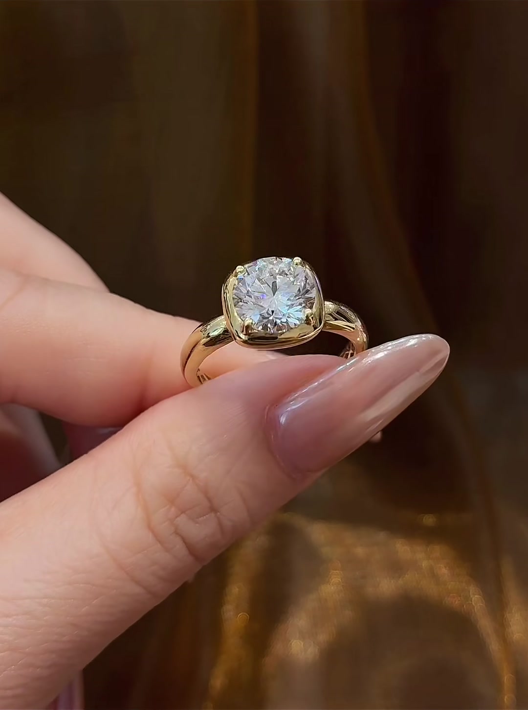 Front view of lab-grown diamond cushion bezel engagement ring for modern proposals