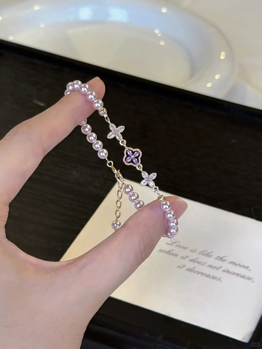 Detail view of double-strand high-lustre freshwater pearl bracelet for bridal styling
